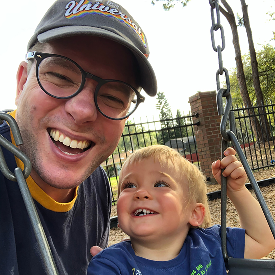 Daddy with Sebastian playing on swing